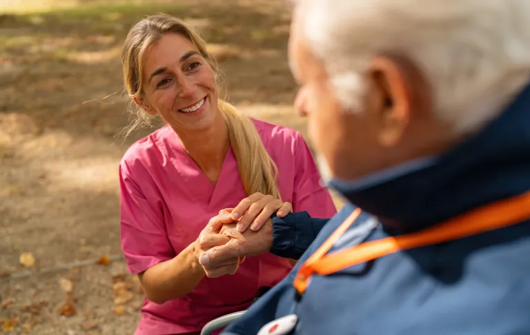 Image of staff looking after resident